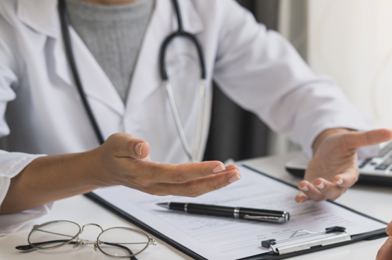 Professional medical doctor consulting her patient at hospital, Healthcare concept